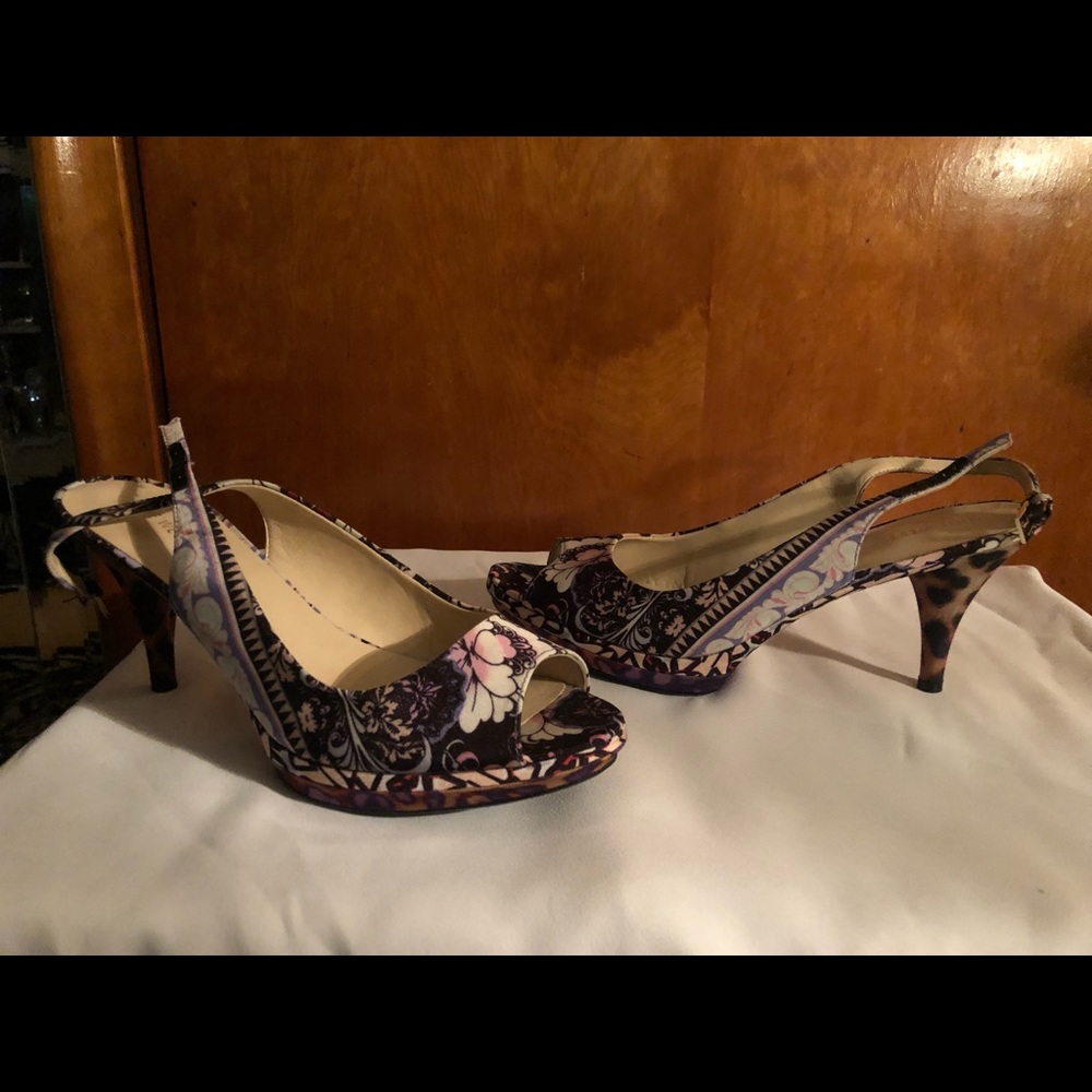 Multicolored animal print platform sling backs.